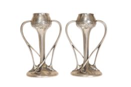 ARCHIBALD KNOX FOR LIBERTY & CO A PAIR OF ENGLISH PEWTER TULIP VASES, NO.