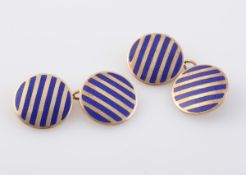 A PAIR OF GOLD AND ENAMEL CUFFLINKS, each circular plaque set with blue striped enamelling,