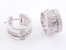 A PAIR OF 18 CARAT WHITE GOLD AND DIAMOND "ATLAS" CUFF EARRINGS BY TIFFANY & CO,