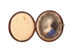 A DIAMOND, PERIDOT, SPINEL AND RUBY FRAMED PORTRAIT MINIATURE, oval,