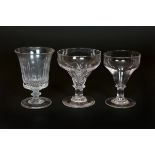 THREE LARGE 19th CENTURY RUMMERS, the first with ogee, part-fluted bowl on a knopped stem,