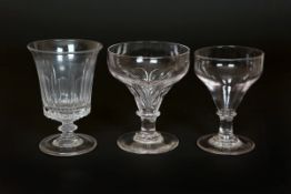 THREE LARGE 19th CENTURY RUMMERS, the first with ogee, part-fluted bowl on a knopped stem,