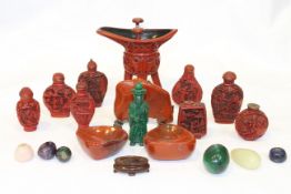 A GROUP OF CHINESE OBJECTS, including red lacquer snuff bottles, wine vessel, carved figure, etc.