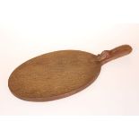 ROBERT THOMPSON OF KILBURN A MOUSEMAN OAK CHEESEBOARD,