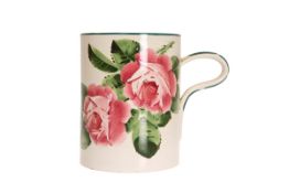 A LARGE WEMYSS POTTERY TANKARD, with strap handle, painted with roses,