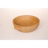 ROBERT THOMPSON OF KILBURN A MOUSEMAN OAK NUT DISH, circular, adzed to the exterior,