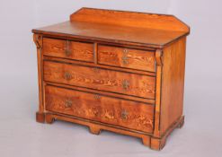 A VICTORIAN PITCH PINE CHEST OF DRAWERS IN PUGIN STYLE, the rectangular top with backboard,