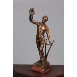 AFTER PERRON, "FRUITS DU TRAVAIL", a patinated spelter figure,