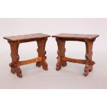 THOMAS WHITTAKER OF LITTLEBECK A PAIR OF GNOMEMAN OAK STOOLS (OR LOW TABLES),