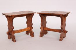 THOMAS WHITTAKER OF LITTLEBECK A PAIR OF GNOMEMAN OAK STOOLS (OR LOW TABLES),