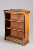 A VICTORIAN WALNUT OPEN BOOKCASE, with inverted break-front and fluted columns,