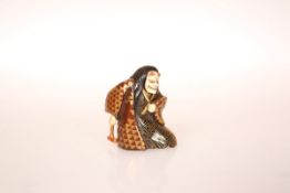 A JAPANESE LACQUERED NETSUKE OF A NOH ACTOR, carved in the role of Hannya, signed,