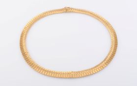 A YELLOW GOLD COLLAR, of snake link design, each articulated link with brushed metal detailing,