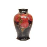 A FINE AND LARGE WILLIAM MOORCROFT VASE IN THE POMEGRANATE PATTERN, of baluster form,