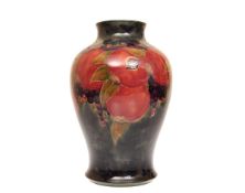 A FINE AND LARGE WILLIAM MOORCROFT VASE IN THE POMEGRANATE PATTERN, of baluster form,