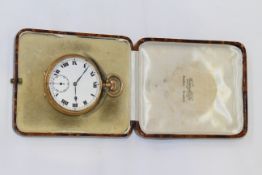 A 9 CARAT GOLD POCKET WATCH, the white enamel dial with Roman numerals and subsidiary seconds,