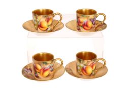 A SET OF FOUR ROYAL WORCESTER FRUIT PAINTED CABINET COFFEE CANS AND SAUCERS, painted by Roberts,