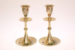 AN UNUSUAL PAIR OF MAPPIN & WEBB ENAMELLED BRASS CANDLESTICKS IN THE AESTHETIC TASTE, c.