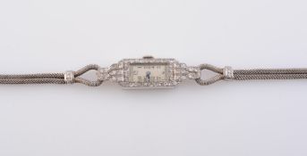 A LADY'S DIAMOND-SET COCKTAIL WATCH, IN THE ART DECO TASTE, SECOND QUARTER 20th CENTURY,