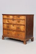 A WALNUT AND OAK CHEST OF DRAWERS, EARLY 18TH CENTURY AND LATER,