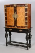A BRASS-MOUNTED, WALNUT AND COROMANDEL CABINET ON STAND,