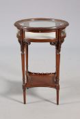 A LATE VICTORIAN CARVED MAHOGANY CIRCULAR BIJOUTERIE TABLE,