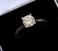 A GOOD SINGLE STONE DIAMOND RING, the round brilliant-cut diamond claw-set on a platinum band.