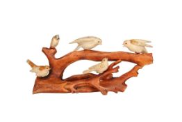 A JAPANESE STAINED IVORY BIRD GROUP, EARLY 20th CENTURY,