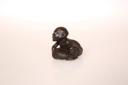 A JAPANESE WOOD NETSUKE OF A BLIND BEGGAR, 19th Century, with inlaid eye,