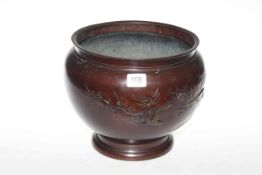 Japanese bronze jardiniere with relief birds and blossom decoration