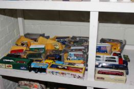 Mainly Corgi models of buses, delivery vans and cars,