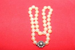 Cultured pearl necklace with paste clasp,