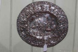 19th Century silvered copper plaque in Renaissance style, repousse with battle scene, marked verso,