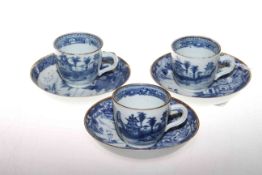 Three Chinese blue and white cups and saucers