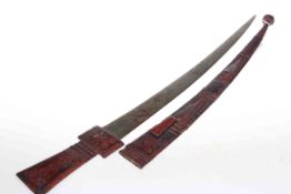 Tribal sword with leather handle and scabbard