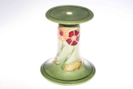 Minton floral decorated jardiniere stand on green ground,