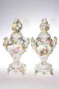 Pair of Carl Thieme Potschappel floral encrusted vases and covers, 39.