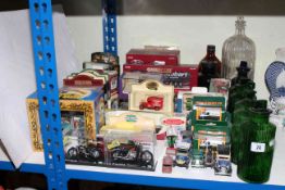Boxed model vehicles and apothecary jars