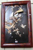 Oriental panel with applied decoration of an eagle,