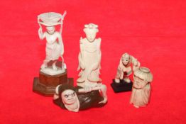 Two Japanese netsukes and three small pieces of ivory (5)