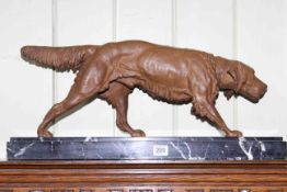 Patinated hound sculpture