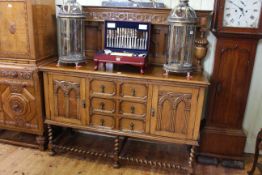 1920's Jacobean style carved oak sideboard with raised back