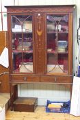 Edwardian inlaid mahogany china cabinet having two glazed panel doors above two drawers on square