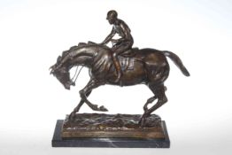 Bronze sculpture of horse and jockey