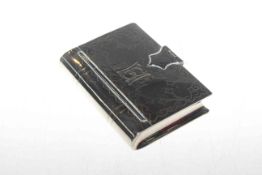 Novelty white metal snuff box in the form of a book, late 19th/early 20th Century,