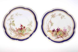 Pair of Royal Worcester grape and blackberry plates, circa 1908, each signed W.