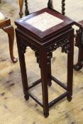 Oriental carved hardwood and marble inset jardiniere stand, 67.