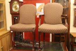 Set of thirteen shaped back dining chairs including seven carvers