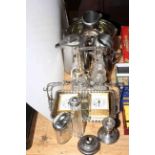 Silver plated ware including cruet, silver topped toilet jars and candlestick,