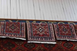 Set of three matching Persian design rugs